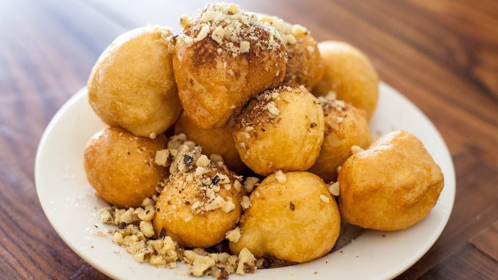 Loukoumades: Fried Dough Drizzled With Honey, Walnuts & Cinnamon · 