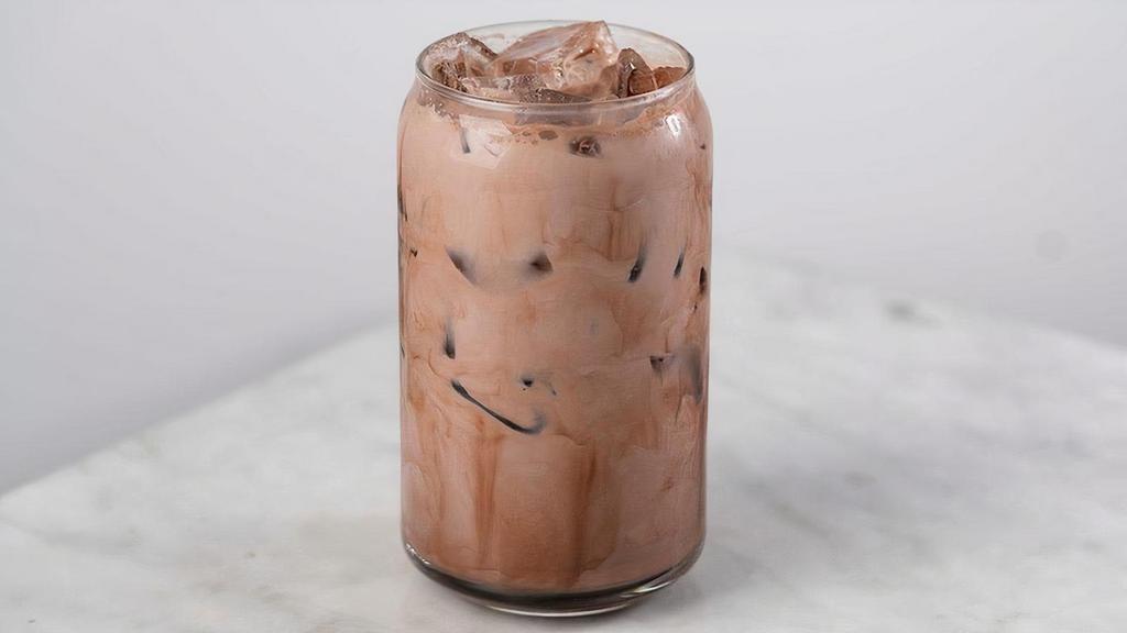 Iced Mocha · Double shot of espresso and cocoa spun in a pitcher with your choice of milk, poured over ice.