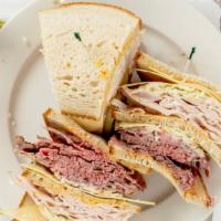 Turkey, Roast Beef & Swiss · Made with coleslaw and Russian dressing. All Swiss cheese, corned beef and turkey are import...