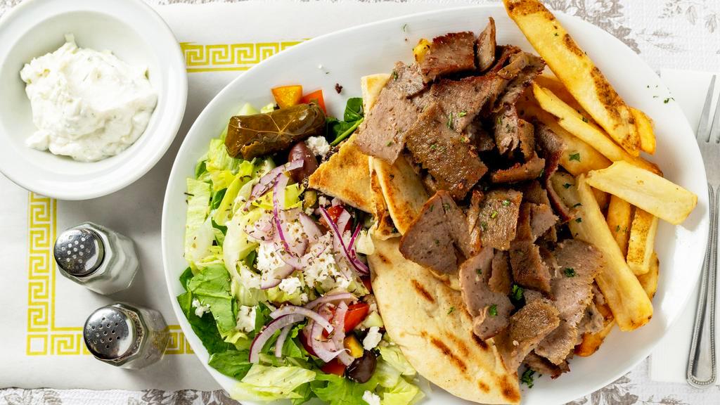 Gyro Platter
 · Authentic homemade Greek cuisine. Sliced gyro meat on toasted pita bread, served with Greek salad and french fries with tzatziki sauce on the side.