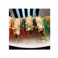 (3) Fish Hard Shell Tacos · Hard shell taco with grilled fish,  lettuce, pico de gallo,  shredded cheese, and sour cream...