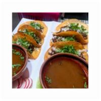 (3) Birria Hard Shell Tacos · 3 Birria hard shell tacos with melted cheese, cilantro, onions and a side order of Birria so...