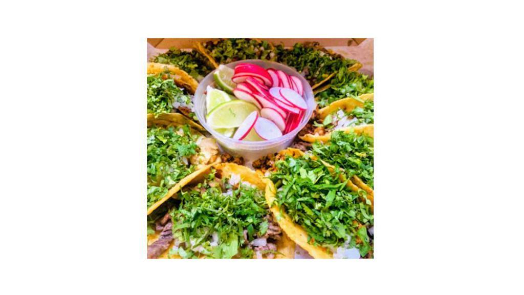Taco Pizza (10 Meat Tacos) · 10 mix meat tacos served with cilantro and onions: 2 al pastor, 2 chorizo, 2 chicken, 2 beef, 2 cecina.