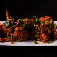 Drums Of Heaven · Chicken wings, fresh herbs, chili and peppers