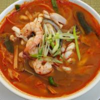 Spicy Seafood Noodle Soup · Shrimp. squid, mussels, vegetables and udon noodles in spicy broth soup.