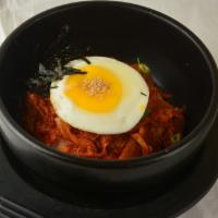 Dolsot Kimchi Fried Rice · Stir-fried kimchi over rice served on a hot stone bowl. Add beef, chicken, tofu for an addit...