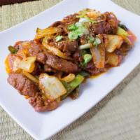 Stir Fried Spicy Pork · Marinated spicy sliced pork stir-fried with vegetables and spicy red pepper paste. Add over ...