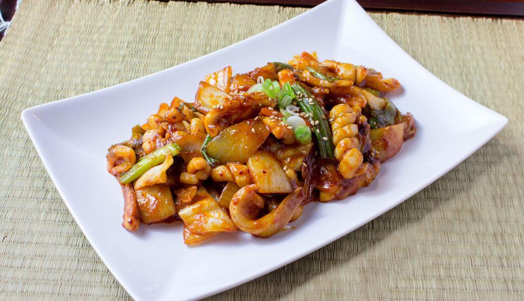 Stir Fried Spicy Squid · Stir-fried spicy squid and vegetables. Add over rice on hot stone bowl & egg for an additional charge.