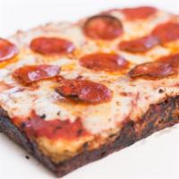 Craft Your Own (Pan Pizza) · Thick, homemade pizza squares-detroit pizza, Sicilian, or taglio- it's all pan pizza to us.