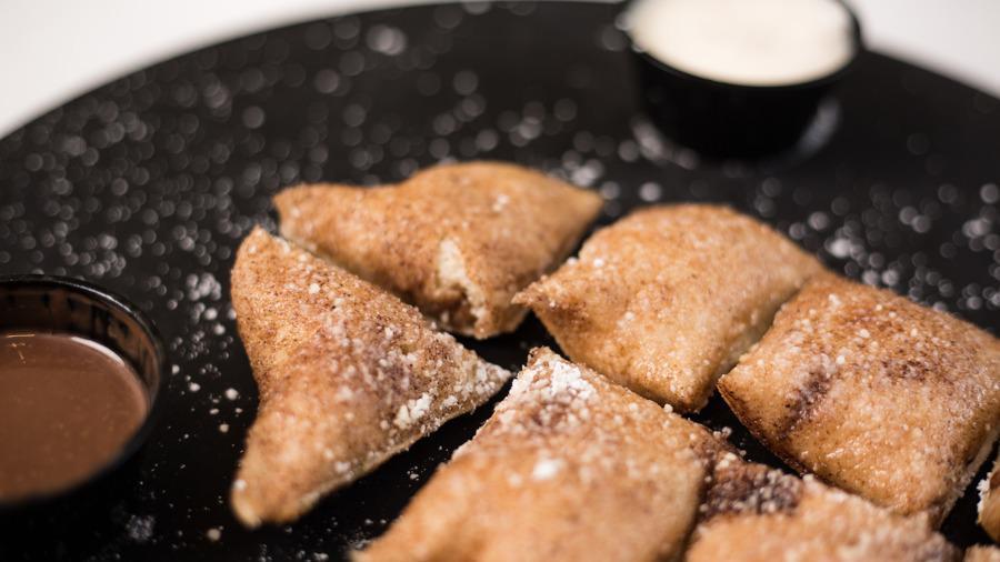 Dessert Dough · Lightly cooked cinnamon-sugar dough’(similar to fried dough), with confectionery sugar And choice of Nutella dip or vanilla glaze dip.