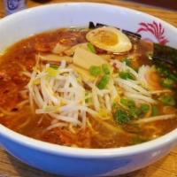 Naruto Ramen · Soy sauce based noodle soup with bean sprouts, fish cake, 
bamboo shoot, egg, scallion, drie...