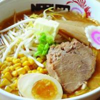 Miso Ramen · Miso based noodle soup with bean sprouts, fish cake, bamboo shoot, egg, scallion, butter, co...