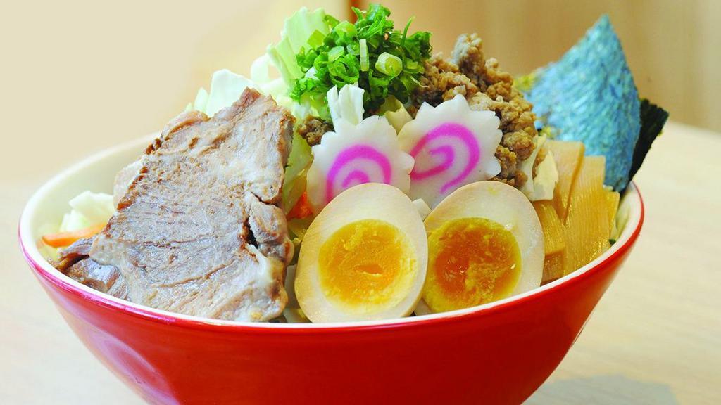 Mega Naruto Ramen · Soy sauce based noodle soup with bean sprouts, bamboo shoot, fish cake, stir fried vegetable, egg, scallion, minced pork, and roasted pork or chicken breast. (Pork and Chicken Broth)