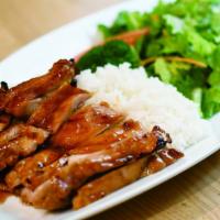 Chicken Teriyaki Platter · Grilled chicken teriyaki with rice and a side of salad.