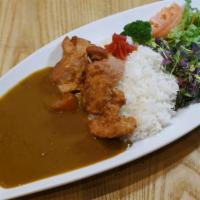 Kara Age Curry Platter · Fried chicken with curry, rice and a side of salad.