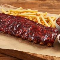 Full Rack Baby Back Ribs · Fall-off-the-Bone goodness, a full rack served with your choice of sauce: Classic BBQ, Alaba...
