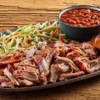 Pulled Pork Plate · Cooked slow and pulled apart to create a mouth-watering sensation. With 2 sides and 3 pickle...