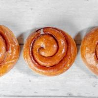 Cinnamon Roll · Our Famous hand rolled Cinnamon Roll covered in glaze