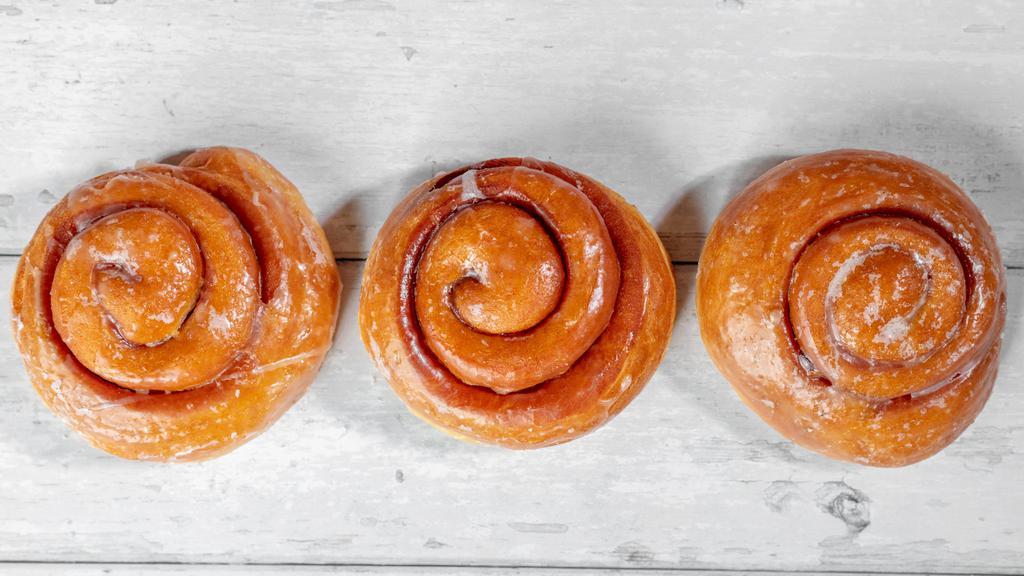 Cinnamon Roll · Our Famous hand rolled Cinnamon Roll covered in glaze