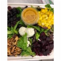 Big Island Beet · Roasted beets mangoes cranberries candied walnuts goat cheese mixed field greens balsamic gl...