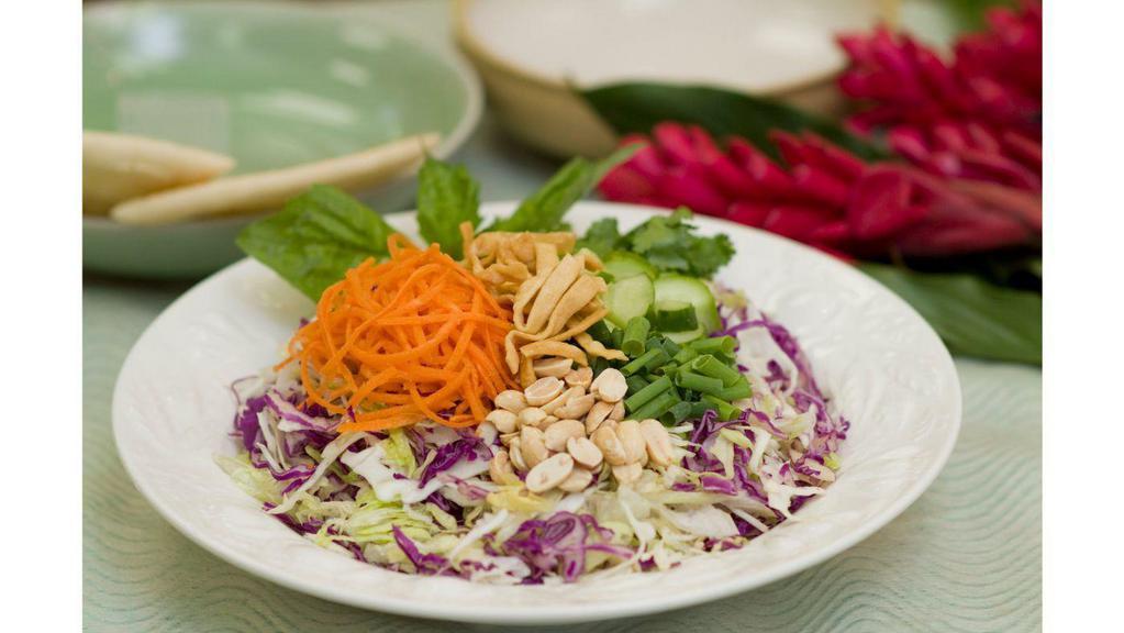 Satay  · With grilled chicken breast or vegetarian. Shredded carrots cucumbers green onions cilantro basil won ton strips roasted peanuts romaine cabbage satay dressing
