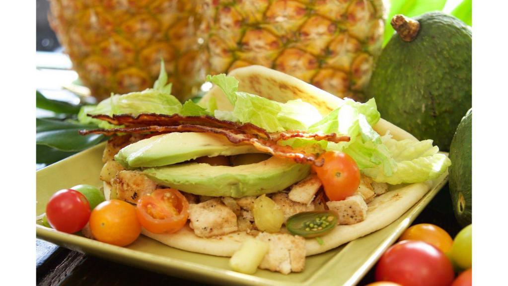 Aloha Pineapple Wrap · Grape tomatoes, bacon, avocado, grilled pineapple, provolone, romaine, mayonnaise, grilled chicken breast on pita bread.