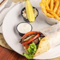 Beef Gyro · on Pita Bread with Lettuce, Tomato, Onions & Tzatziki Sauce. Deluxe with French Fries for an...