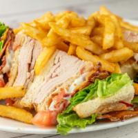 Sliced Turkey Club · With Bacon, Lettuce, Tomato, and Mayonnaise.