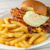 Breakfast Burger · with Crisp Deep Fried Potatoes, Cheese, Bacon & Fried Egg.