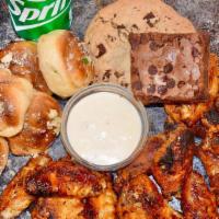 16 Wings, 6 Garlic Knots & 2 Dips + 2 Drinks + 2 Desserts · Jumbo, fresh, roasted wings with our freshly made Garlic Knots, 2 drinks & 2 desserts. Choos...