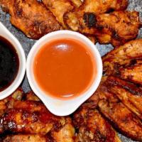 16 Wings · Jumbo, fresh roasted wings. Choose up to two flavors.