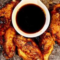 8 Wings · Jumbo, fresh roasted wings. Choose one flavor.