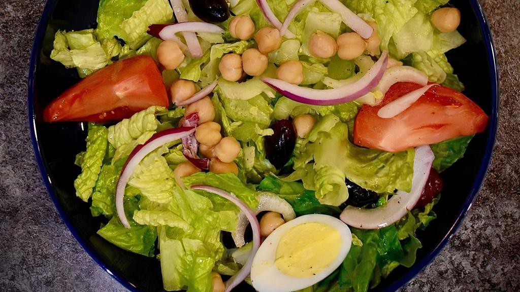 Garden Fresh Salad · Romaine, Celery, Red Onions, Chickpeas, Kalamata Olives, tomato, and hard boiled eggs