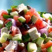 Shepherd Salad · Mix of Tomato and cucumbers mixed with lemon, mint, and topped black olives and feta cheese.