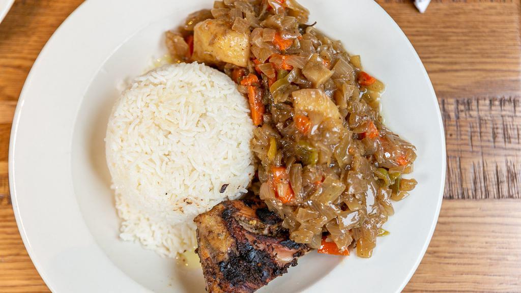 Yassa Poulet · Chicken marinated in fresh lemon juice, sauteed with onions and served with white rice.