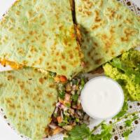 Chicken Quesadilla · Chicken, red onions, peppers, cilantro, melted cheddar and Monterrey Jack cheese. Served wit...