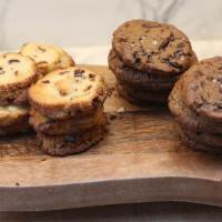 Cranberry Pecan Shortbread · Buttery and soft shortbread cookie with cranberries rolled in chopped pecans

*contains nuts