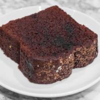 Dark Chocolate Olive Oil Cake · Chocolate cake topped with cocoa and sea salt flakes, not too sweet with nice hints of olive...