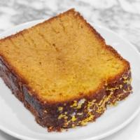 Honey Cornmeal Olive Oil Cake · Olive oil-based cornmeal cake then topped with wildflower honey syrup, lemon zest and sea sa...