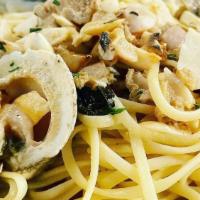 Linguine & Clam Sauce · Fresh chopped clams with your choice of white or red clam sauce.