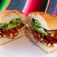 Tortas  · Portuguese roll with refried beans, mayo, tomato, avocado, lettuce, cheese and jalapeno pepp...
