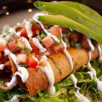 Flautas · Three deep-fried corn tortilla stuffed with pollo. Topped with lettuce, Queso Fresco, Pico d...