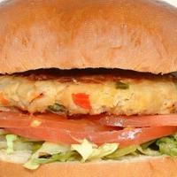 Tuna Burger · Tuna patty, red and green peppers, onions, lettuce and tomatoes on a brioche bun with fresh ...