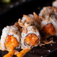Crunchy Spicy Yellowtail Roll · with Crushed Onion.