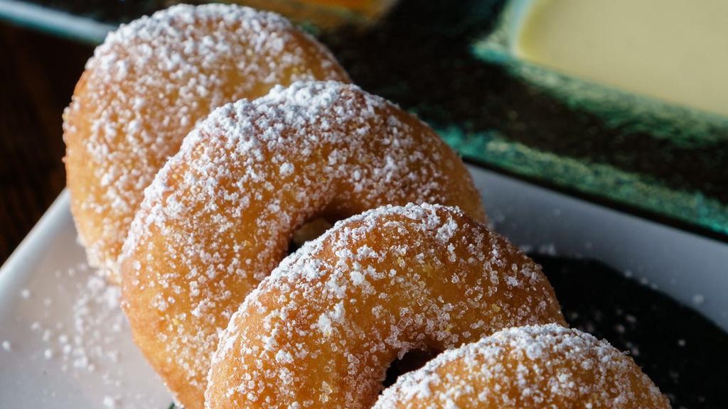Sugar Dusted Doughnuts · Served With a Trio of Dipping Sauces.
