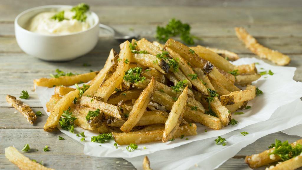 Truffle Parmesan Fries · Exquisite truffle parmesan cheese topped on fresh hand cut potatoes.