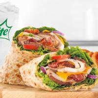 Chicken Club Wrap · Slow roasted chicken breast with pepper bacon, natural cheddar cheese, green leaf lettuce, r...