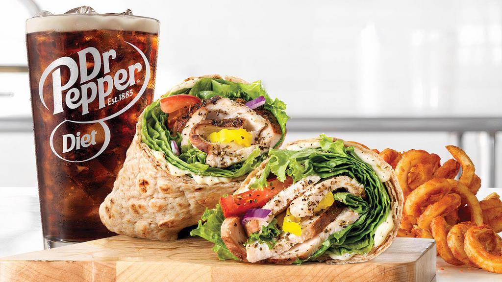 Creamy Mediterranean Chicken Wrap · Slow-roasted chicken breast with cool and creamy tzatziki sauce, banana peppers, green leaf lettuce, tomato, and red onion in an artisan wheat wrap. Visit arbys.com for nutritional and allergen information.