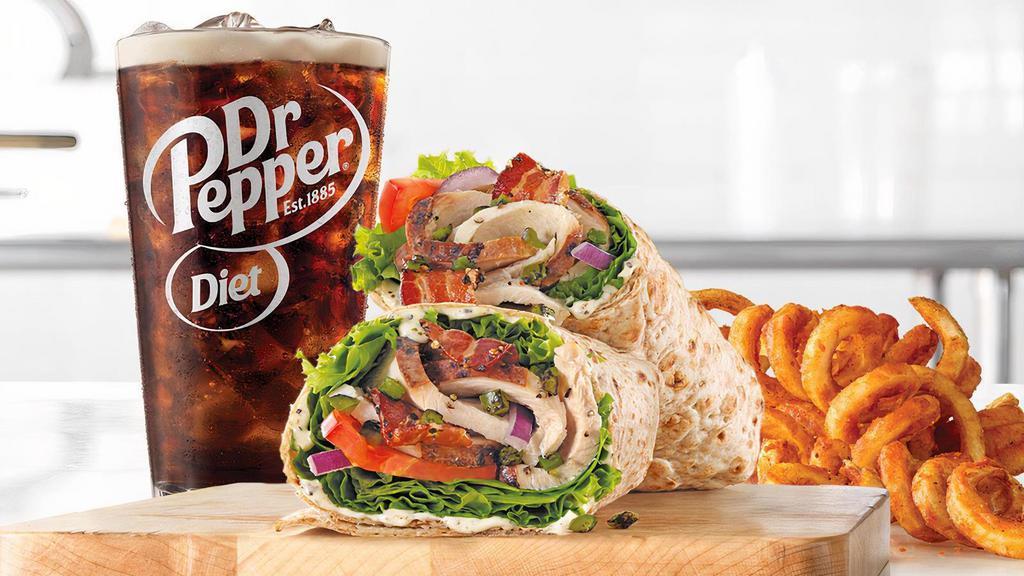 Jalapeno Bacon Ranch Wrap · Slow roasted chicken breast with pepper bacon, cheddar cheese, fire-roasted jalapenos, parmesan peppercorn ranch sauce, green leaf lettuce, red onion, and tomato in an artisan wheat wrap. Visit arbys.com for nutritional and allergen information.
