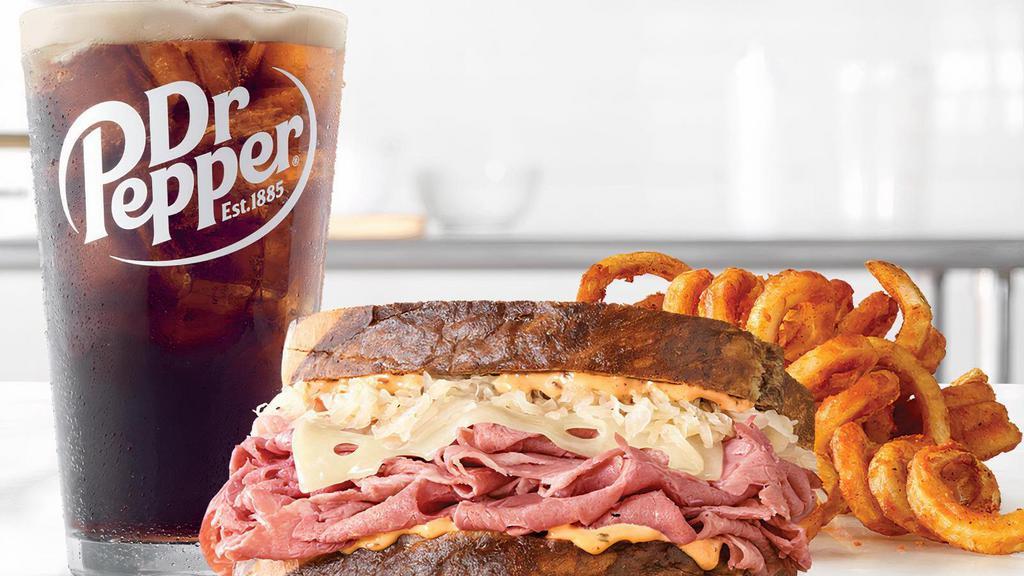 Reuben · Thinly sliced corned beef with melted Swiss cheese, tangy sauerkraut and creamy Thousand Island dressing on toasted marble rye bread.Visit arbys.com for nutritional and allergen information.